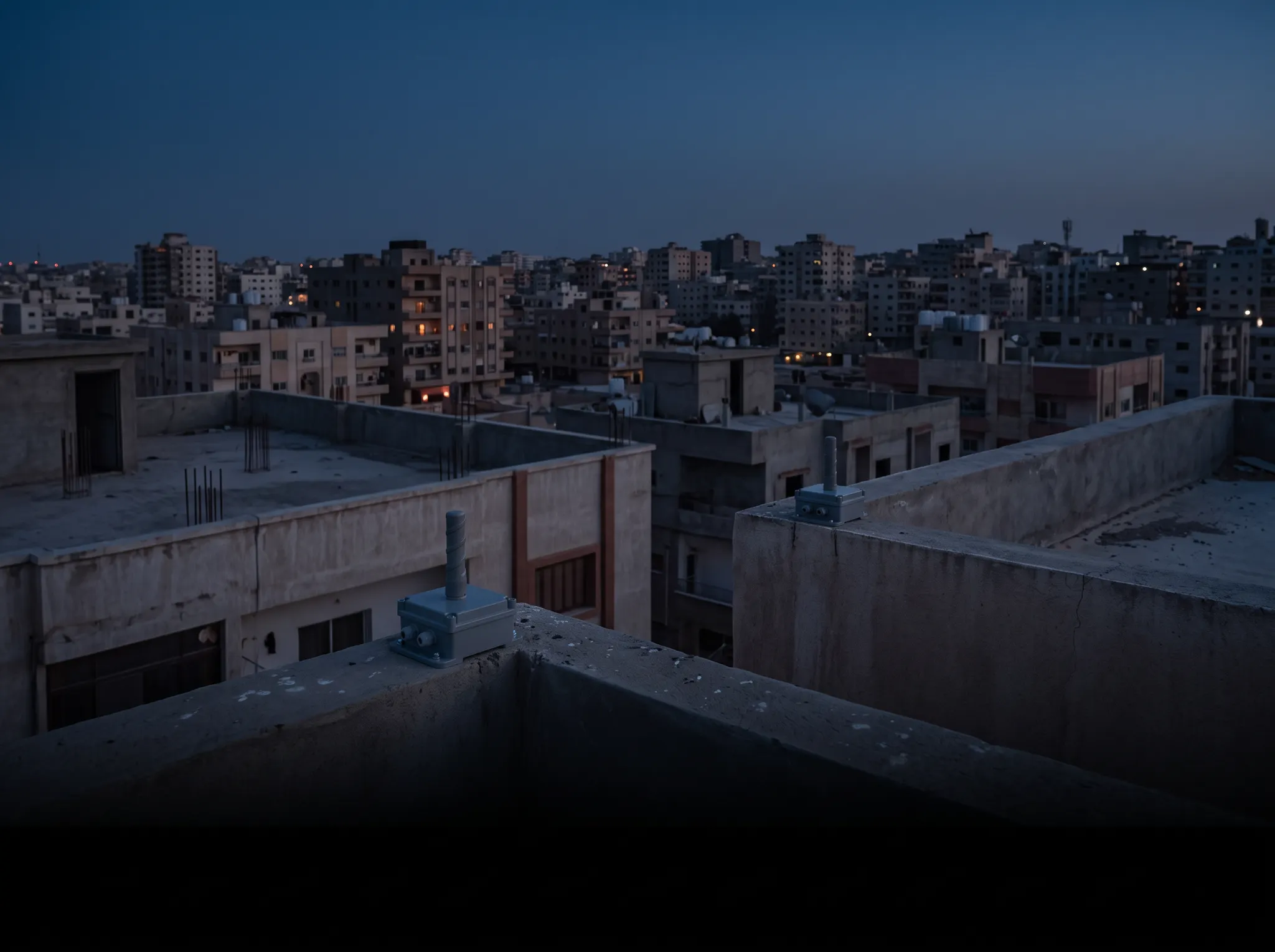 Illustrative peer-to-peer wireless mesh nodes on nearby rooftops